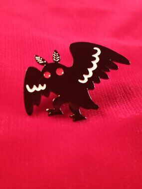 black metal Mothman pin